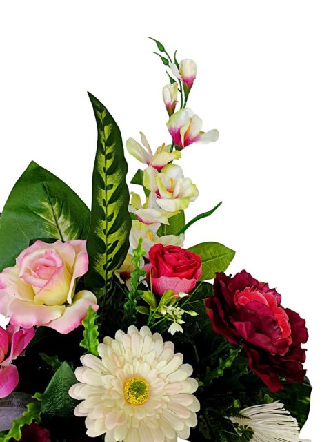 Stroik pięknych sztuchnych kwiatów na cmentarz grób Wszystkich Świętych