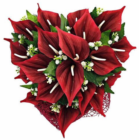 Stroik pięknych sztuchnych kwiatów na cmentarz grób Wszystkich Świętych