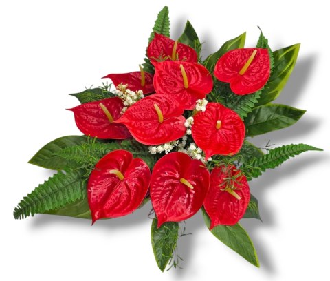 Stroik pięknych sztuchnych kwiatów na cmentarz grób Wszystkich Świętych