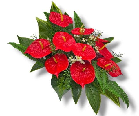 Stroik pięknych sztuchnych kwiatów na cmentarz grób Wszystkich Świętych