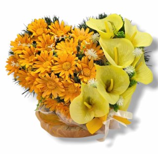 Stroik pięknych sztuchnych kwiatów na cmentarz grób Wszystkich Świętych