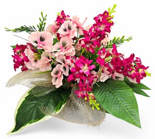 Stroik pięknych sztuchnych kwiatów na cmentarz grób Wszystkich Świętych